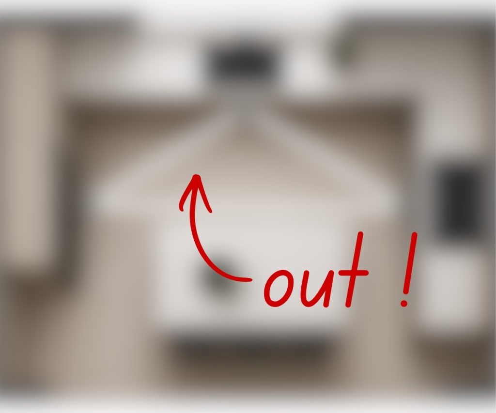 blurry image with the text "out" pointing at something